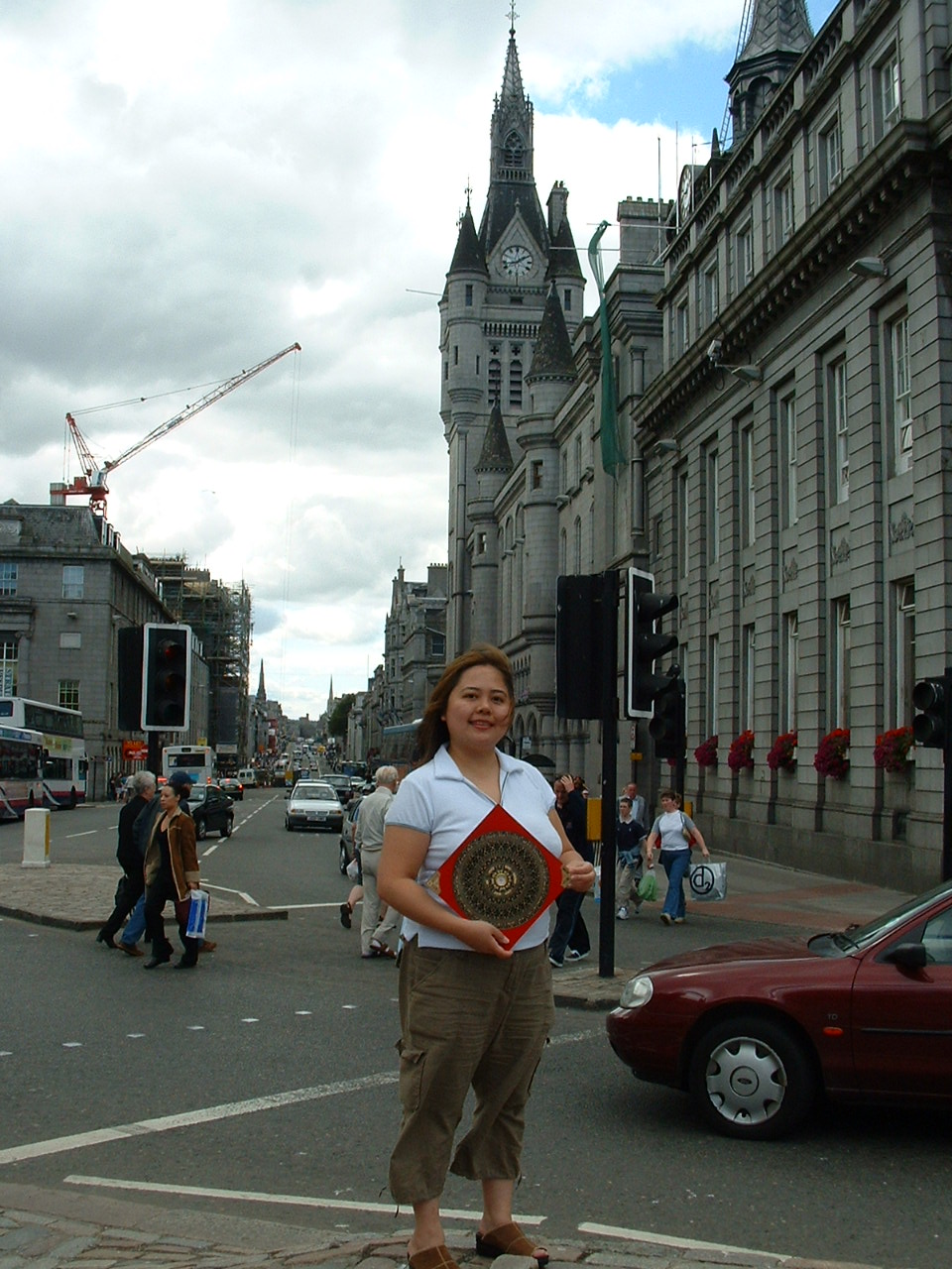 Master Ang with her Feng Shui Loupan compass in Aberdeen, Scotland