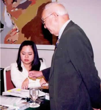 Master Angela Ang receiving instruction from Grand Master Yap Cheng Hai in the 1990s