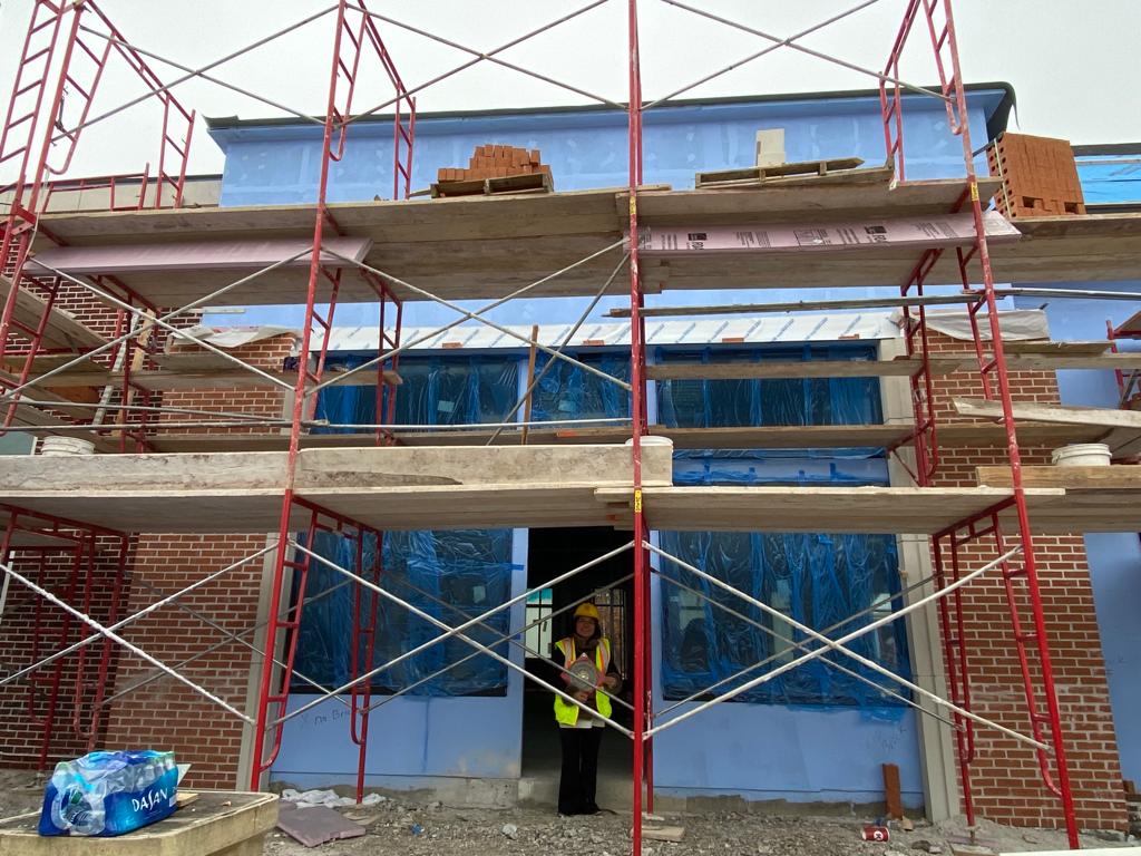 Performing a Feng Shui audit at a unit being transformed into a salon, Birmingham, Alabama, USA