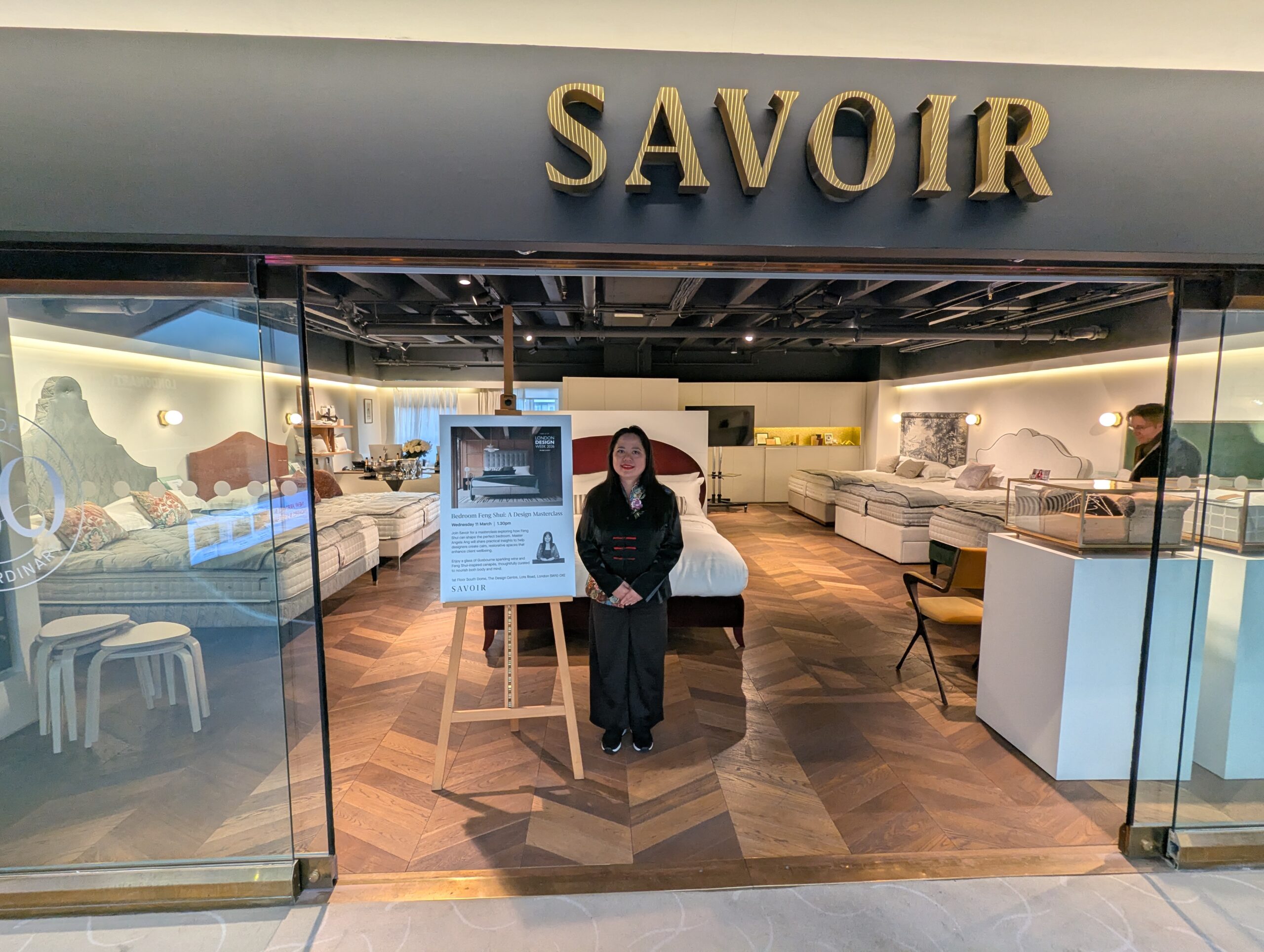 Master Angela at the doorway of the Savoir Beds showroom before her Feng Shui design master class.